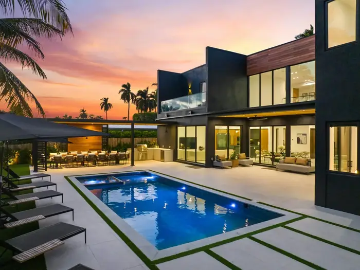 Luxury mansion with pool at sunset from the Dynasty mansions collection