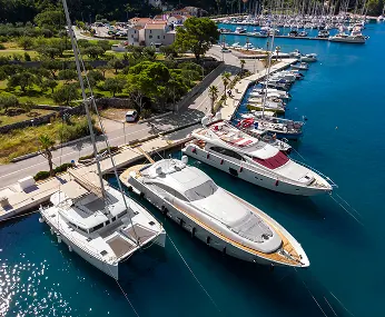 Aerial view of luxury yachts docked at a marina